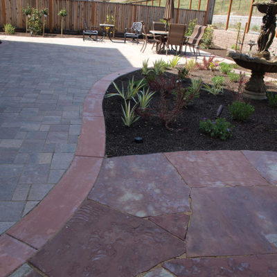 Belgard Urbana pavers edged in concrete with flagstone