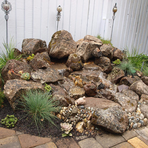 small moss rock water feature